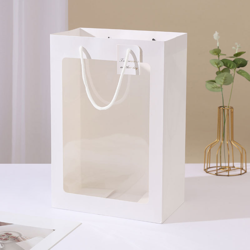Kraft Paper Gift Bag 0.3mm Thick With Hand Length Handle Custom Logo Craft Flat Bottom Wholesale Ret